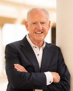 Brian Smith, UGG Founder, arms folded smiling
